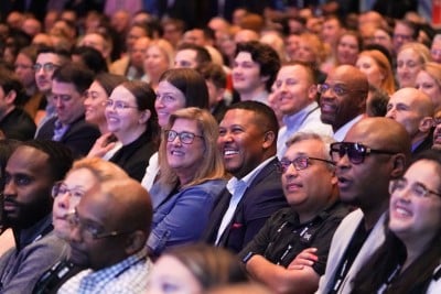 people at ismworld 2023 conference holding institute for supply management