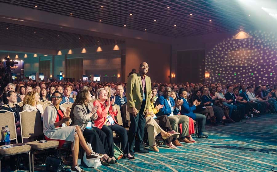 Standing attendee at ism world 2025