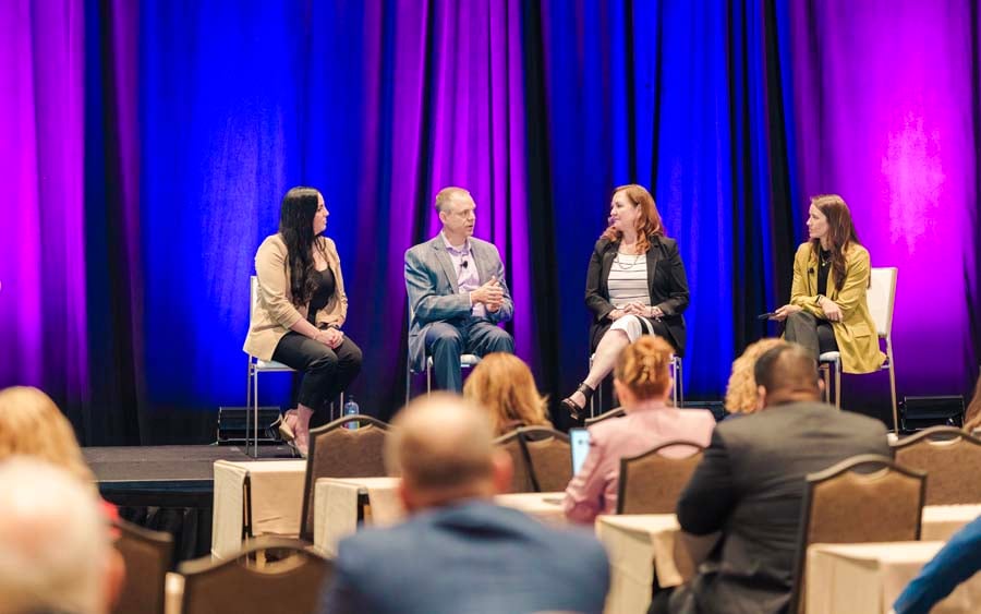 People speaking conversation at ISM World 2025
