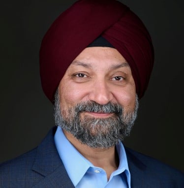 man smiling for a headshot photo