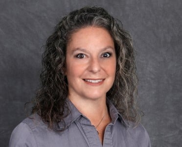women smiling for headshot photo