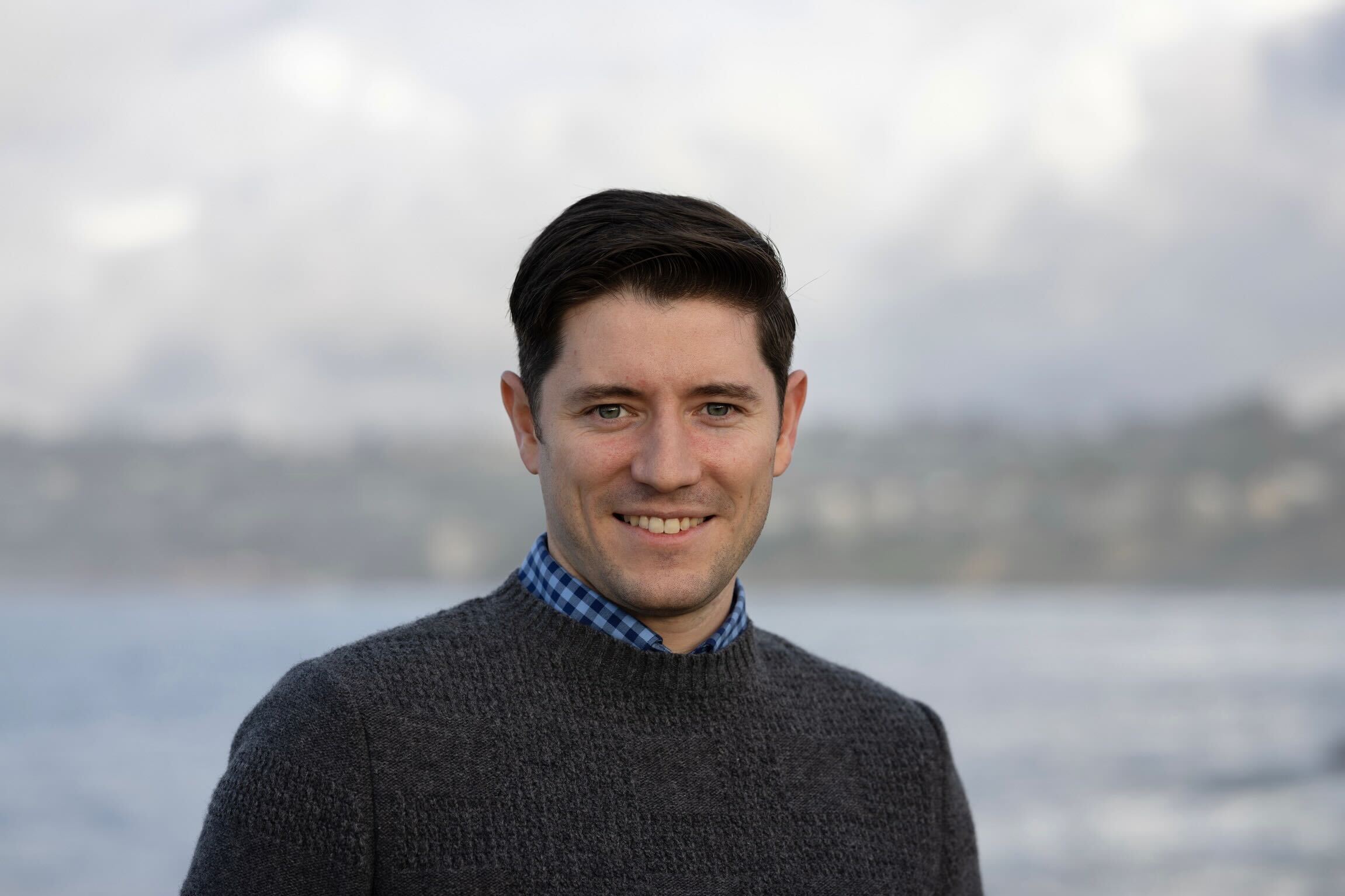 man smiling for headshot