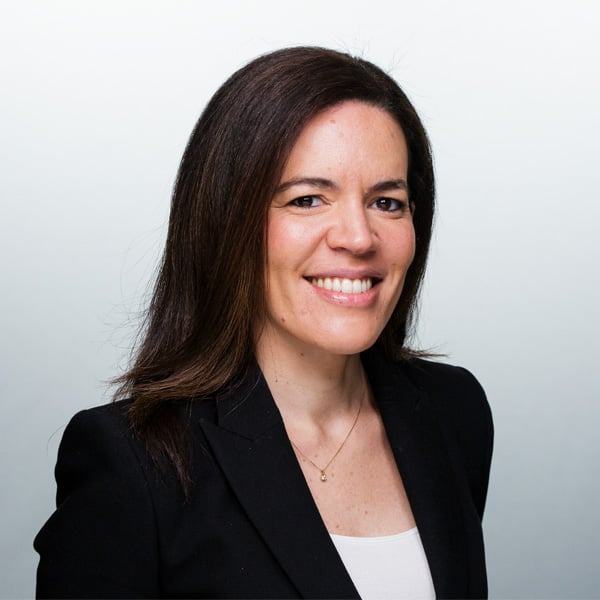 women in tux smiling