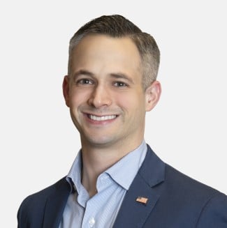 man with short hair headshot