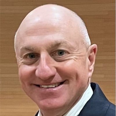 man smiling for headshot photo