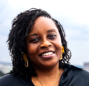 women in black shirt smiling