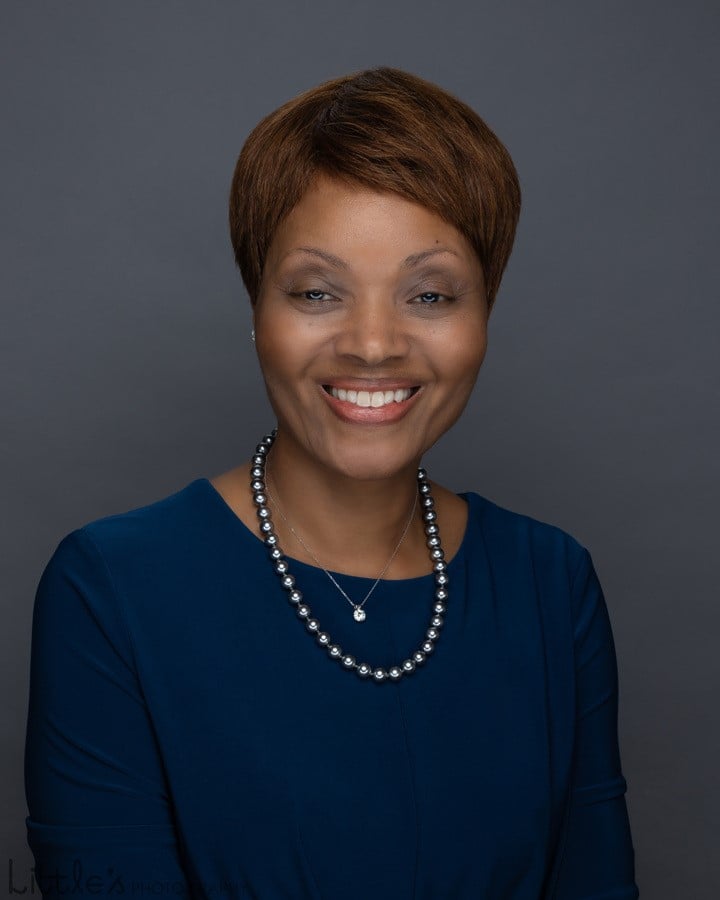 women smiling for headshot